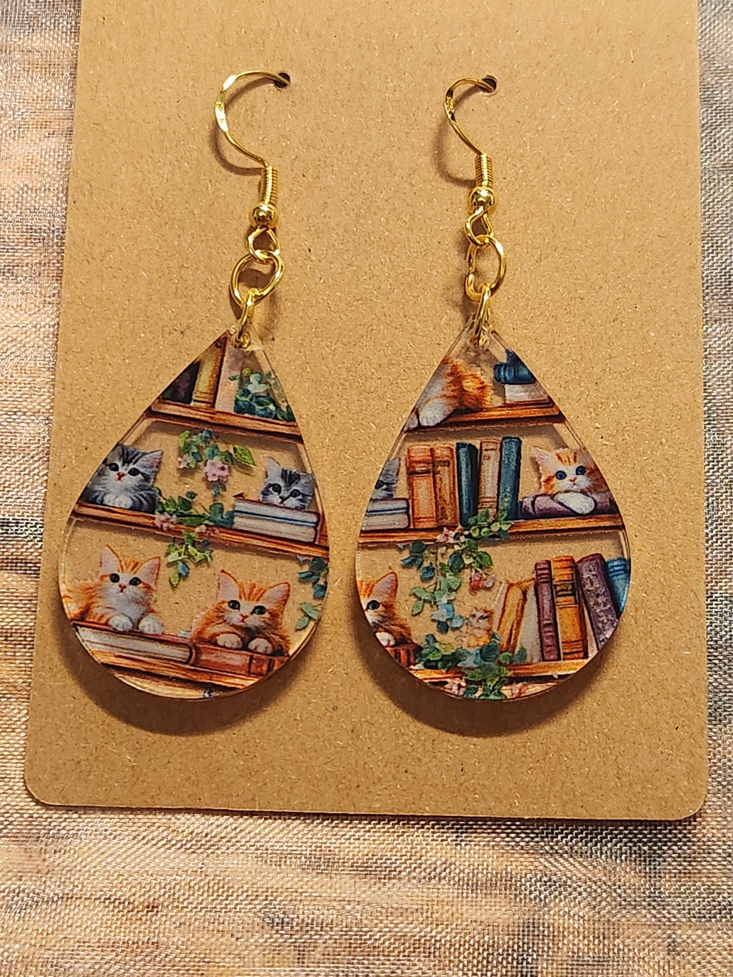 Earrings: Kittens on bookshelf