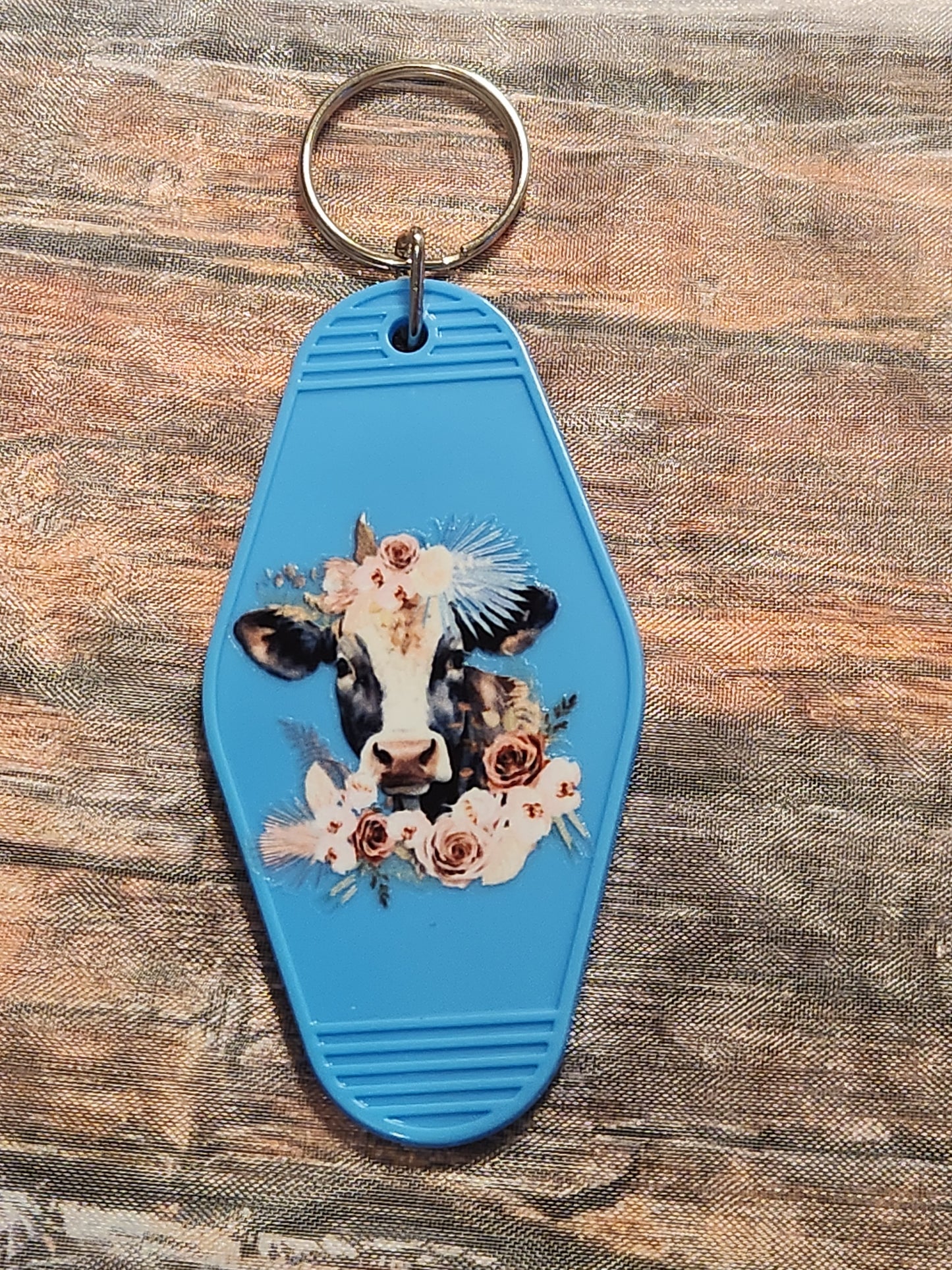 Motel Keychain: Cow with pink flowers