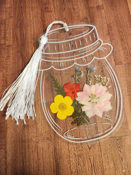 Bookmark: Shades of red, pink, yellow, and purple (white tassel)