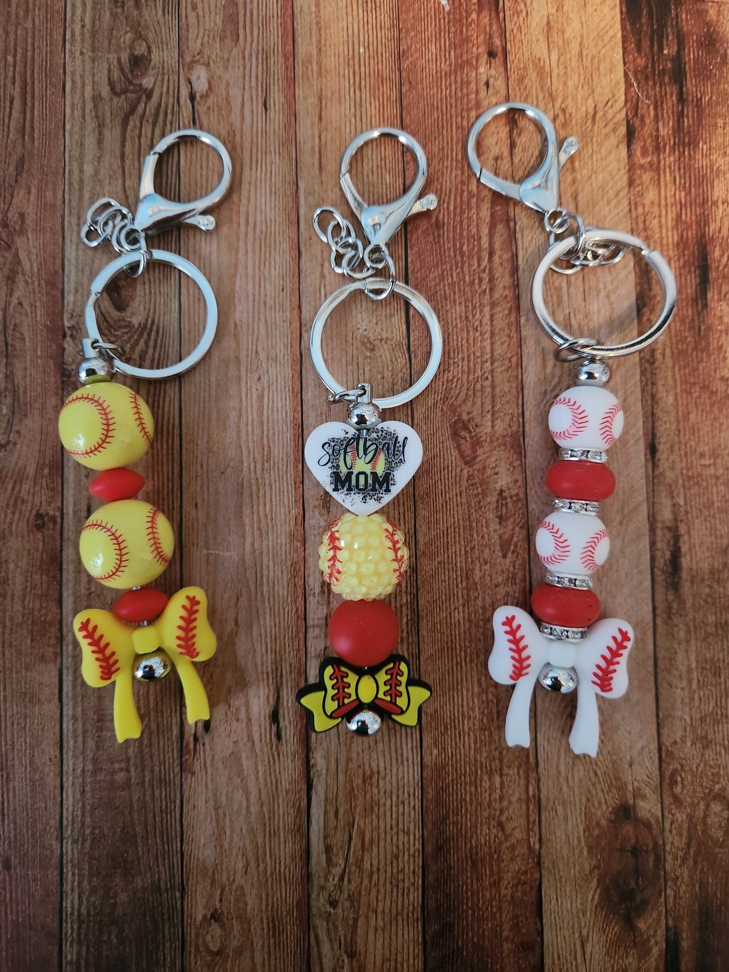 Keychains: Softball Bow (far left)