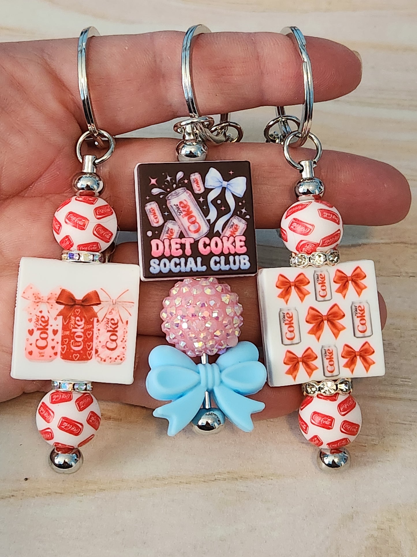 Keychains: Coca Cola Cans with Bows